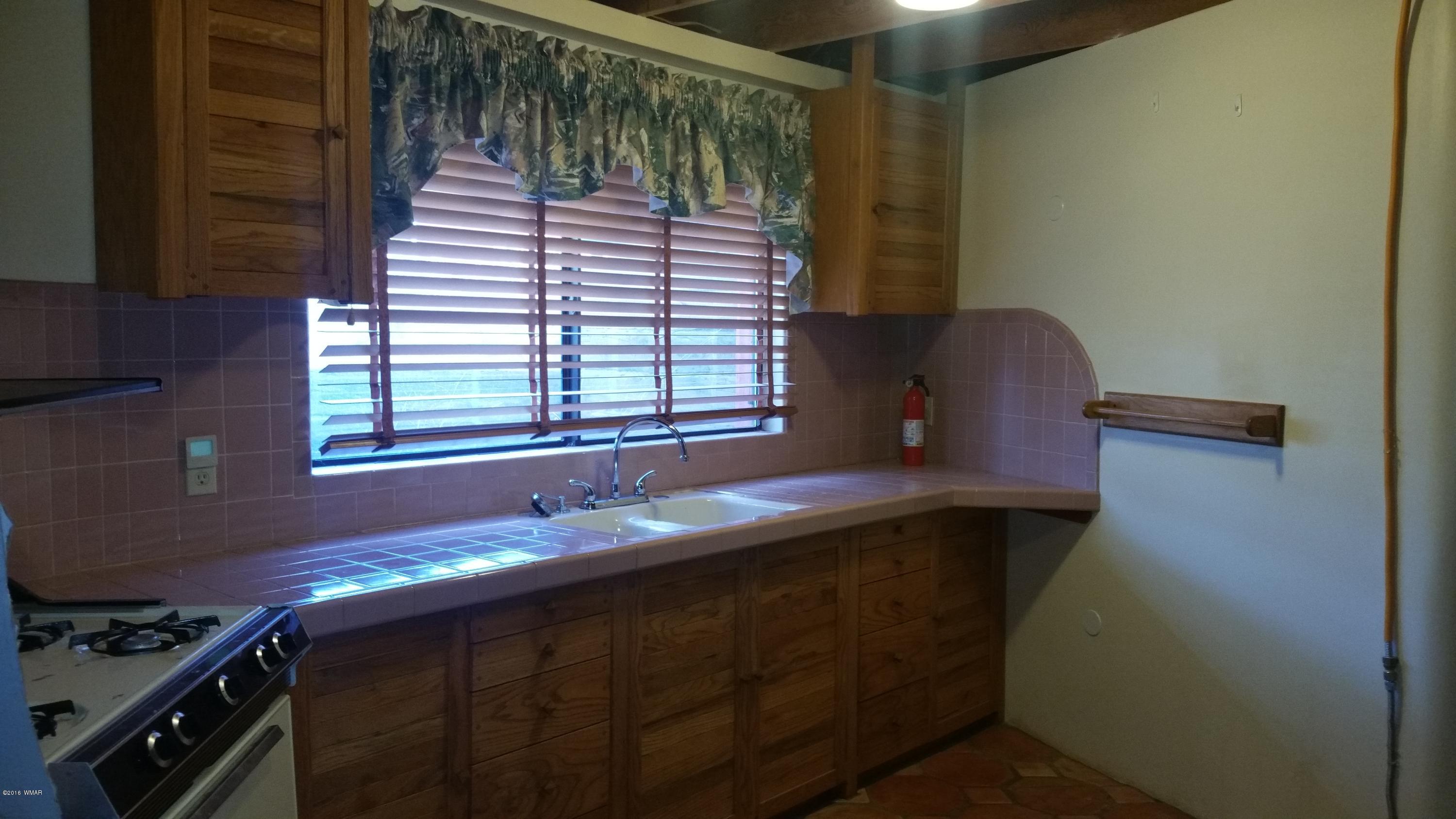 5139 Garibaldi Road Snowflake, AZ 85937 - Photo 15 of 39 a kitchen with a sink and a window