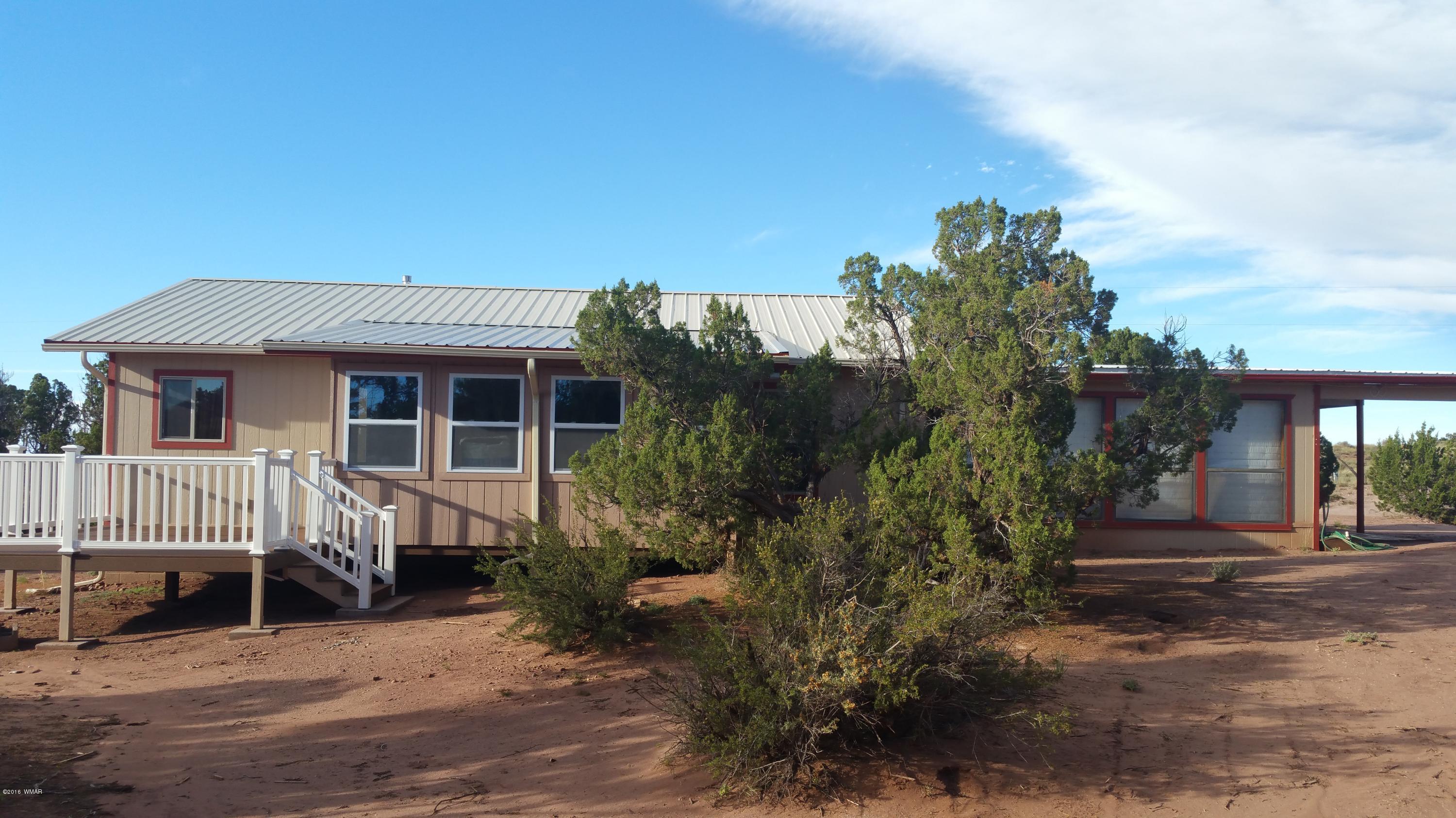 5139 Garibaldi Road Snowflake, AZ 85937 - Photo 19 of 39 a front view of a house with a yard