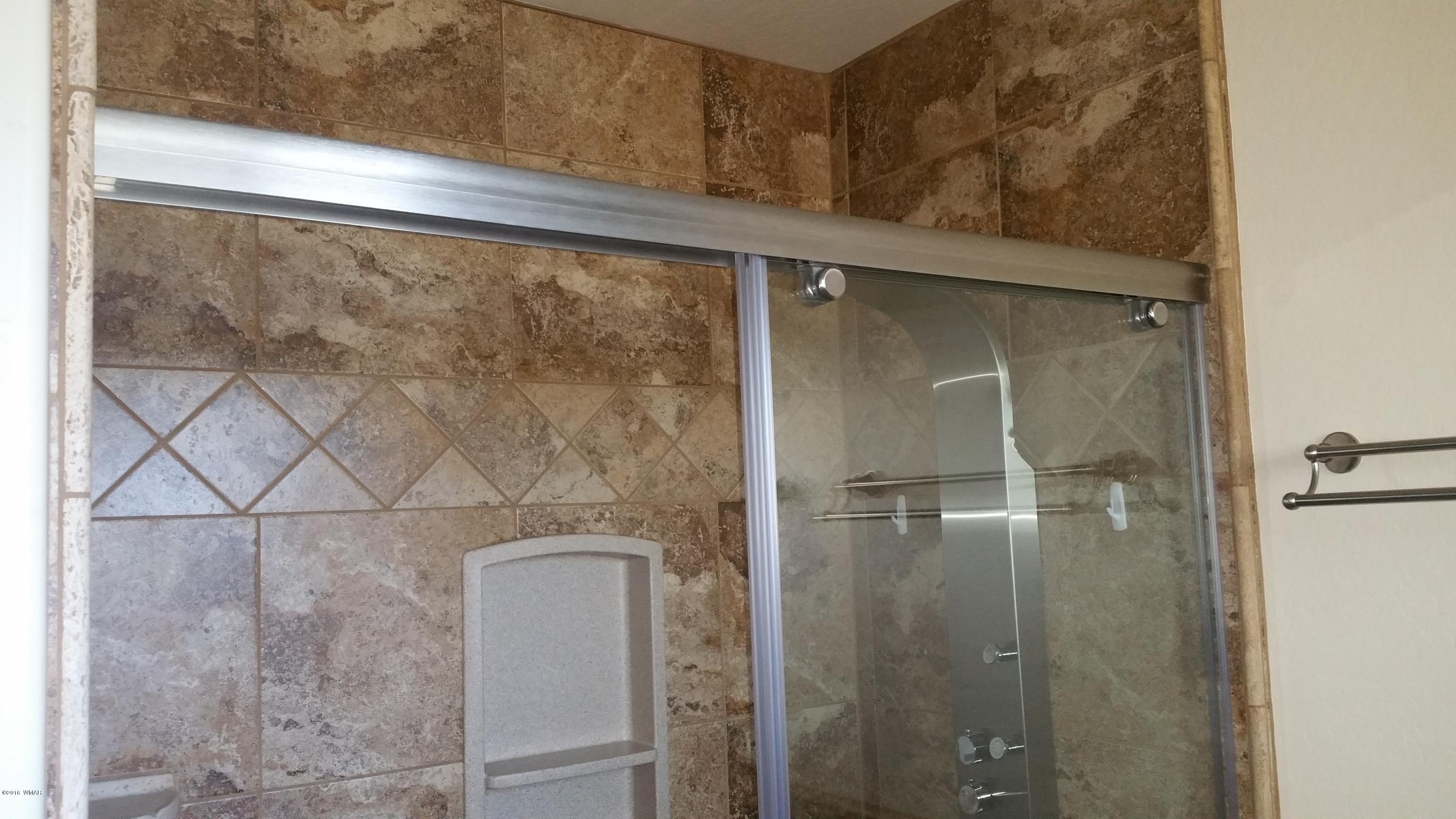 5139 Garibaldi Road Snowflake, AZ 85937 - Photo 31 of 39 a bathroom with a shower