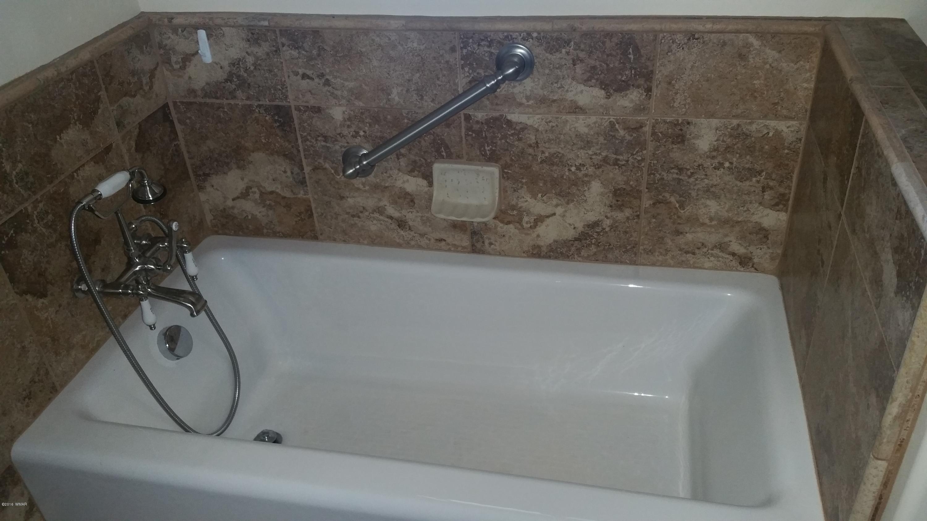 5139 Garibaldi Road Snowflake, AZ 85937 - Photo 33 of 39 a bathroom with a shower