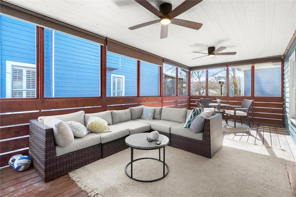 153 Randolph Street Northeast Atlanta, GA 30312 - Photo 22 of 37 a living room with furniture and a large window