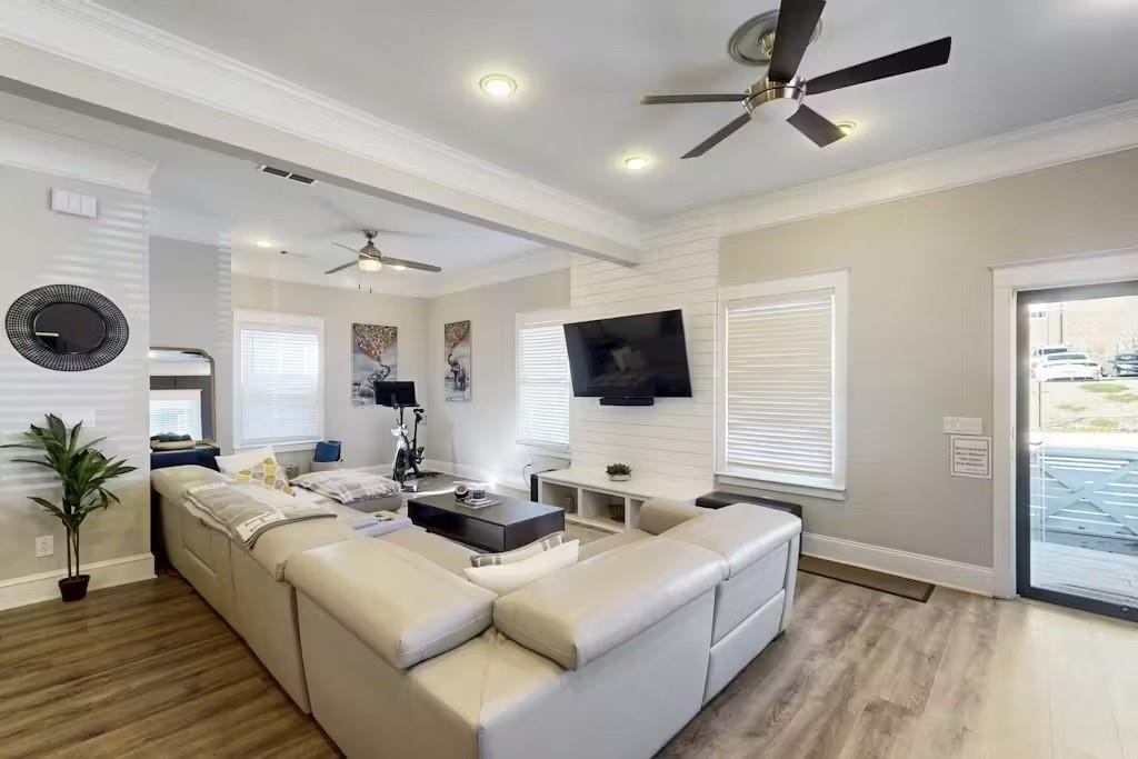 153 Randolph Street Northeast Atlanta, GA 30312 - Photo 4 of 37 a living room with furniture and a flat screen tv