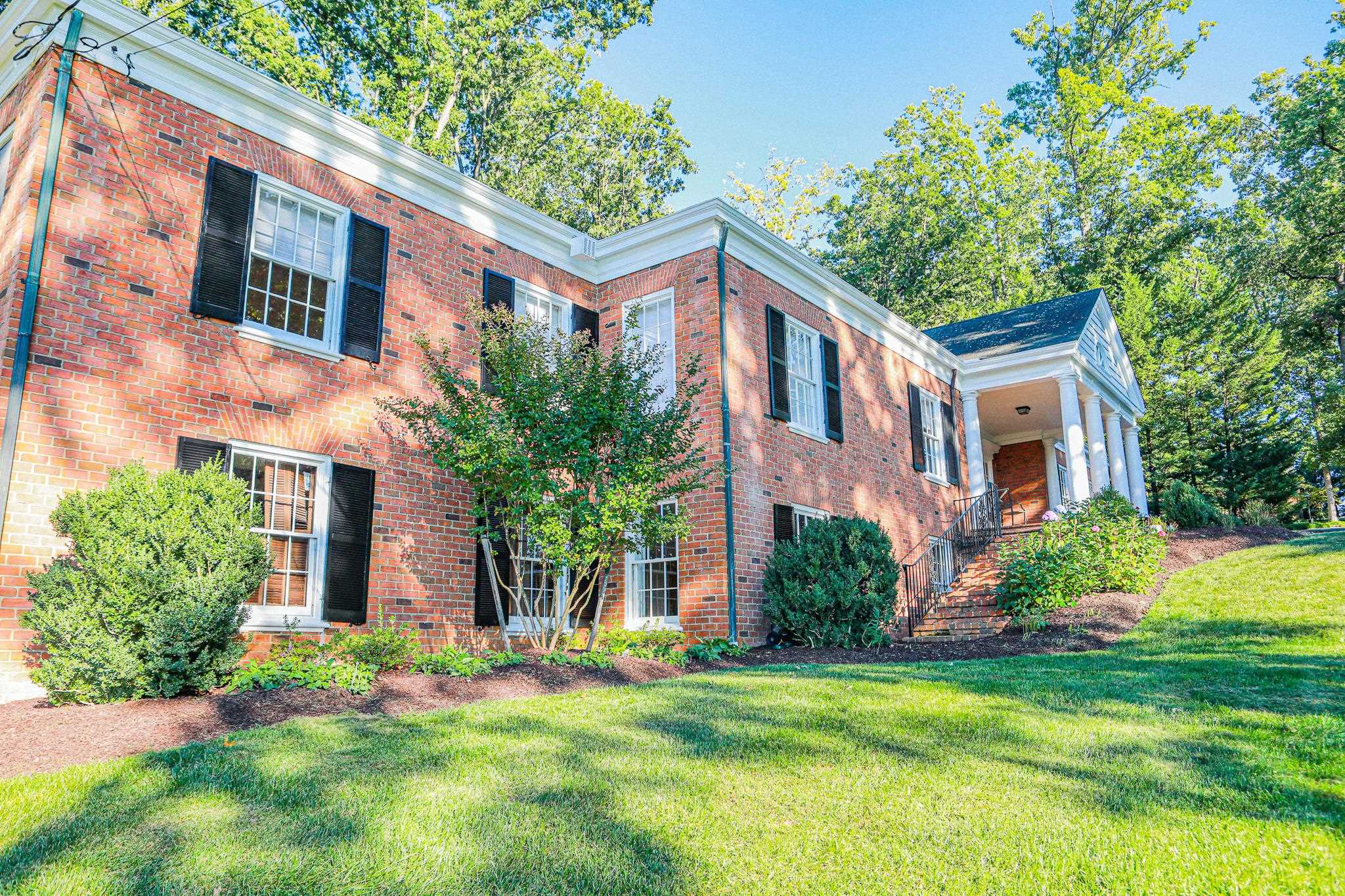 19 Ridgewood Drive Staunton, VA 24401 - Photo 12 of 73 a front view of a house with a yard and trees
