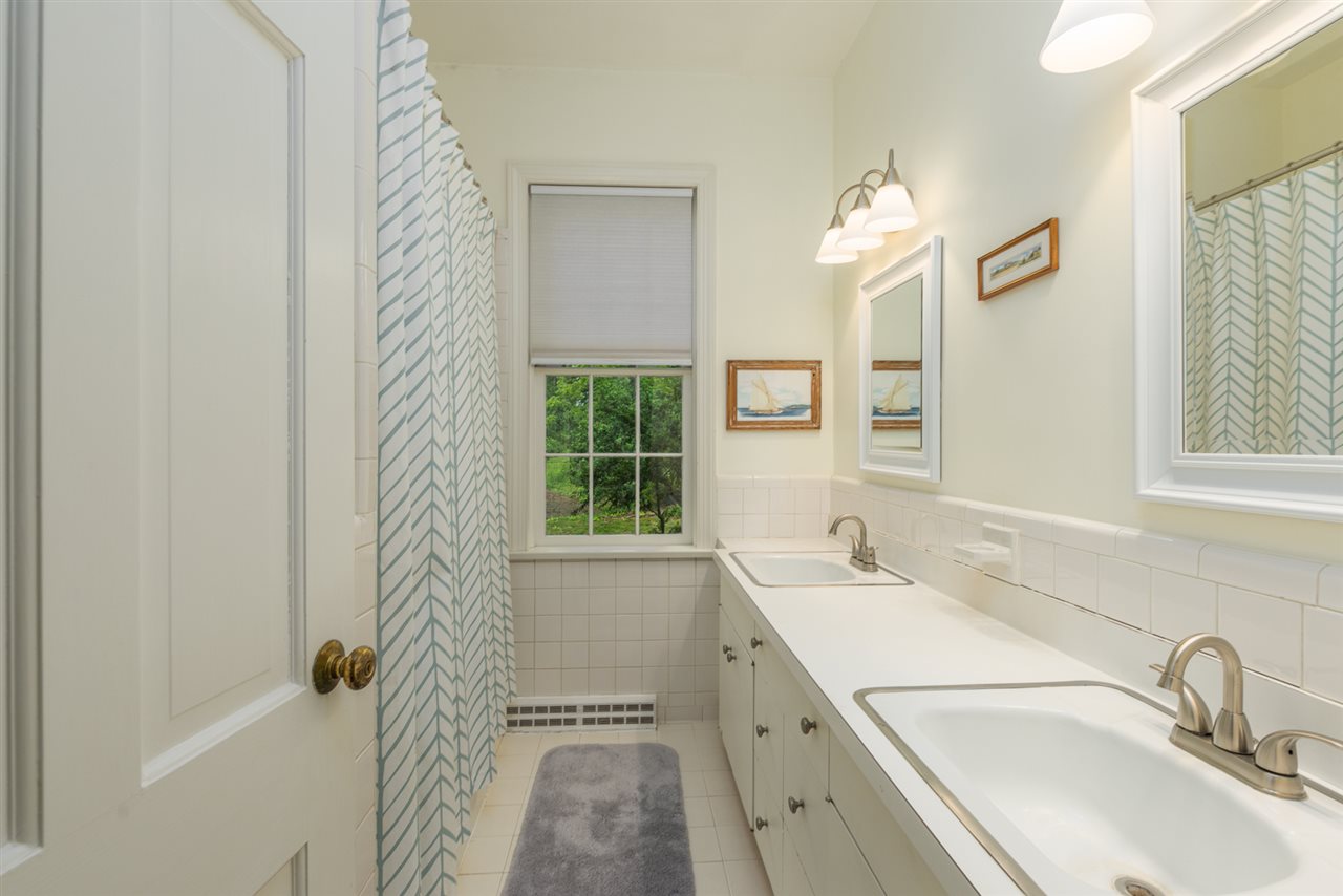 19 Ridgewood Drive Staunton, VA 24401 - Photo 56 of 73 a bathroom with a sink and a mirror