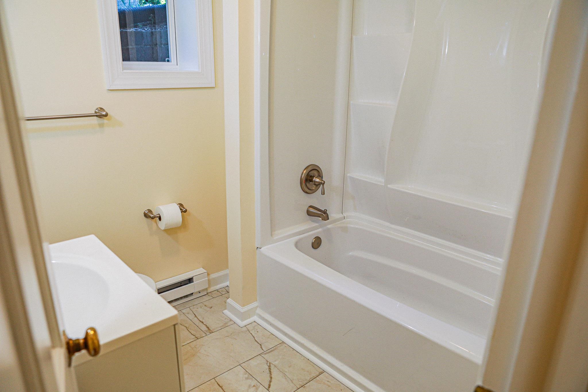 19 Ridgewood Drive Staunton, VA 24401 - Photo 67 of 73 a bathroom with a bathtub
