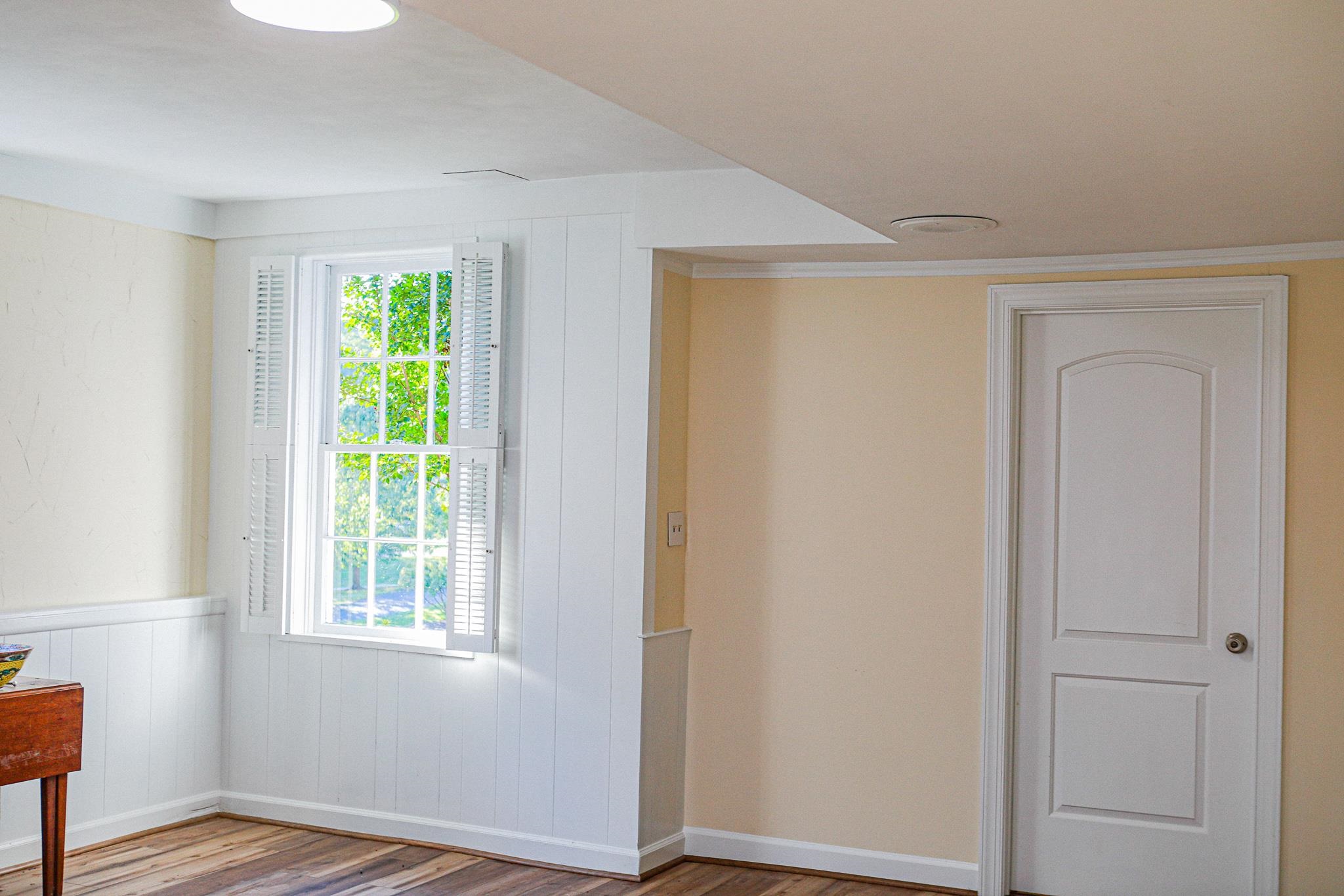19 Ridgewood Drive Staunton, VA 24401 - Photo 69 of 73 a view of an empty room with wooden floor and a window