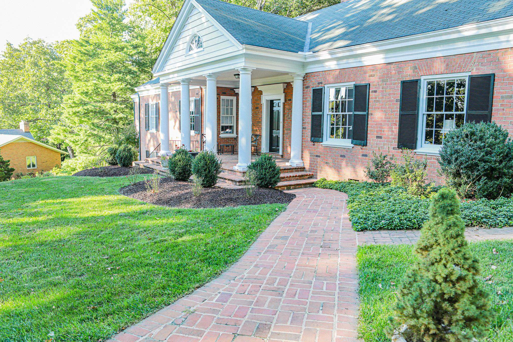 19 Ridgewood Drive Staunton, VA 24401 - Photo 7 of 73 a front view of a house with garden and porch
