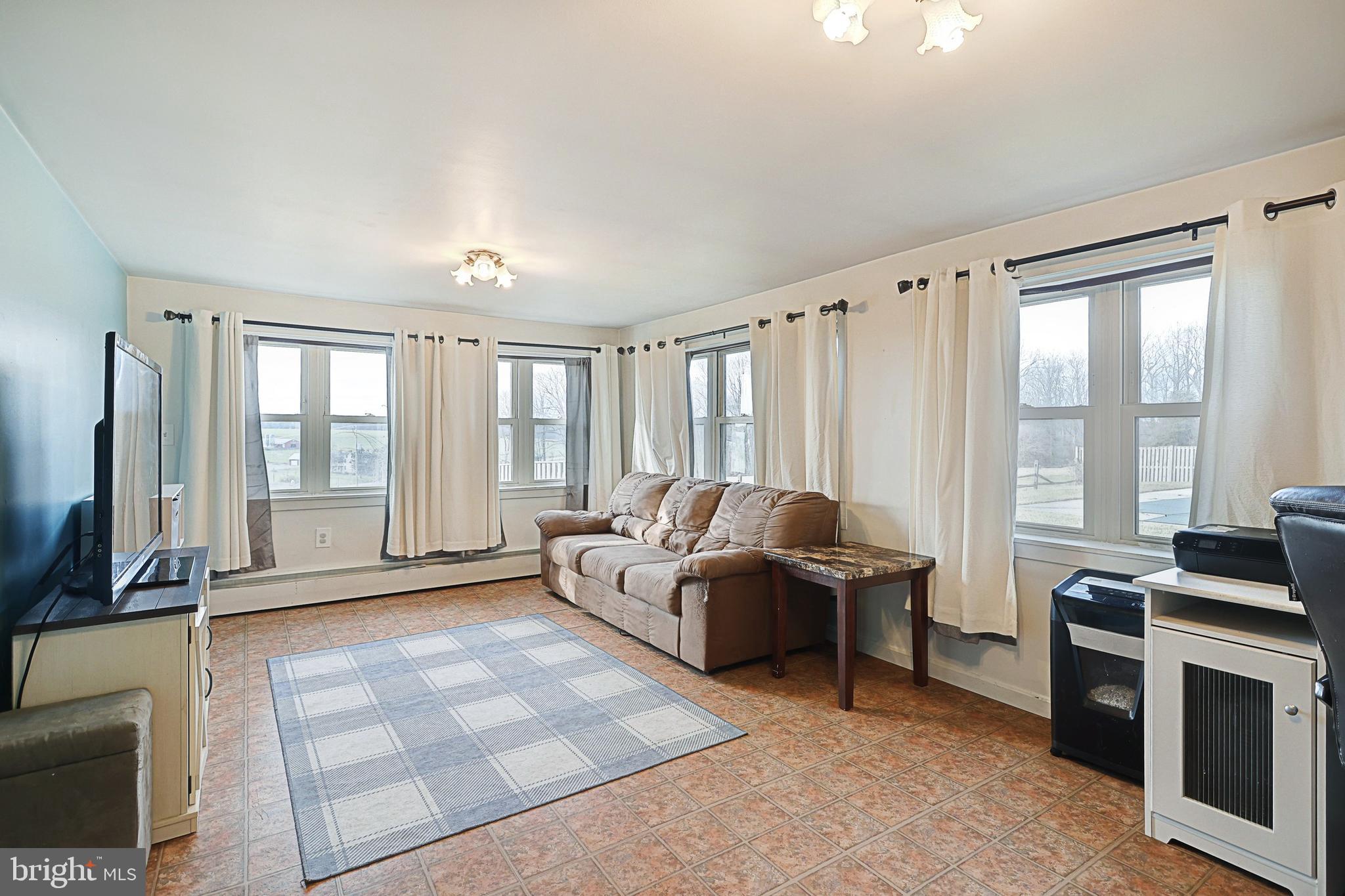 1309 Bryansville Road Delta, PA 17314 - Photo 12 of 36 Sunroom/Family Room