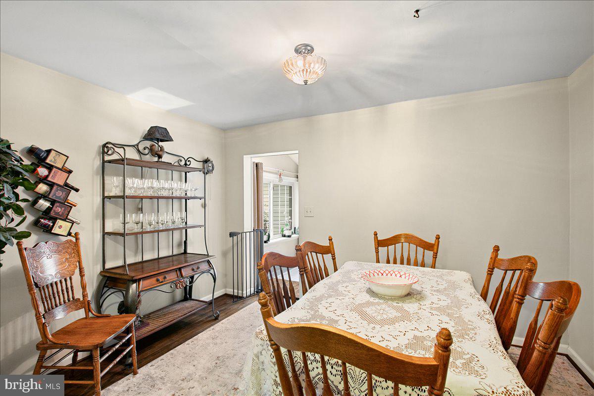 19266 Mockingbird Heights Road Triangle, VA 22172 - Photo 9 of 35 a bedroom with furniture and a wooden floor
