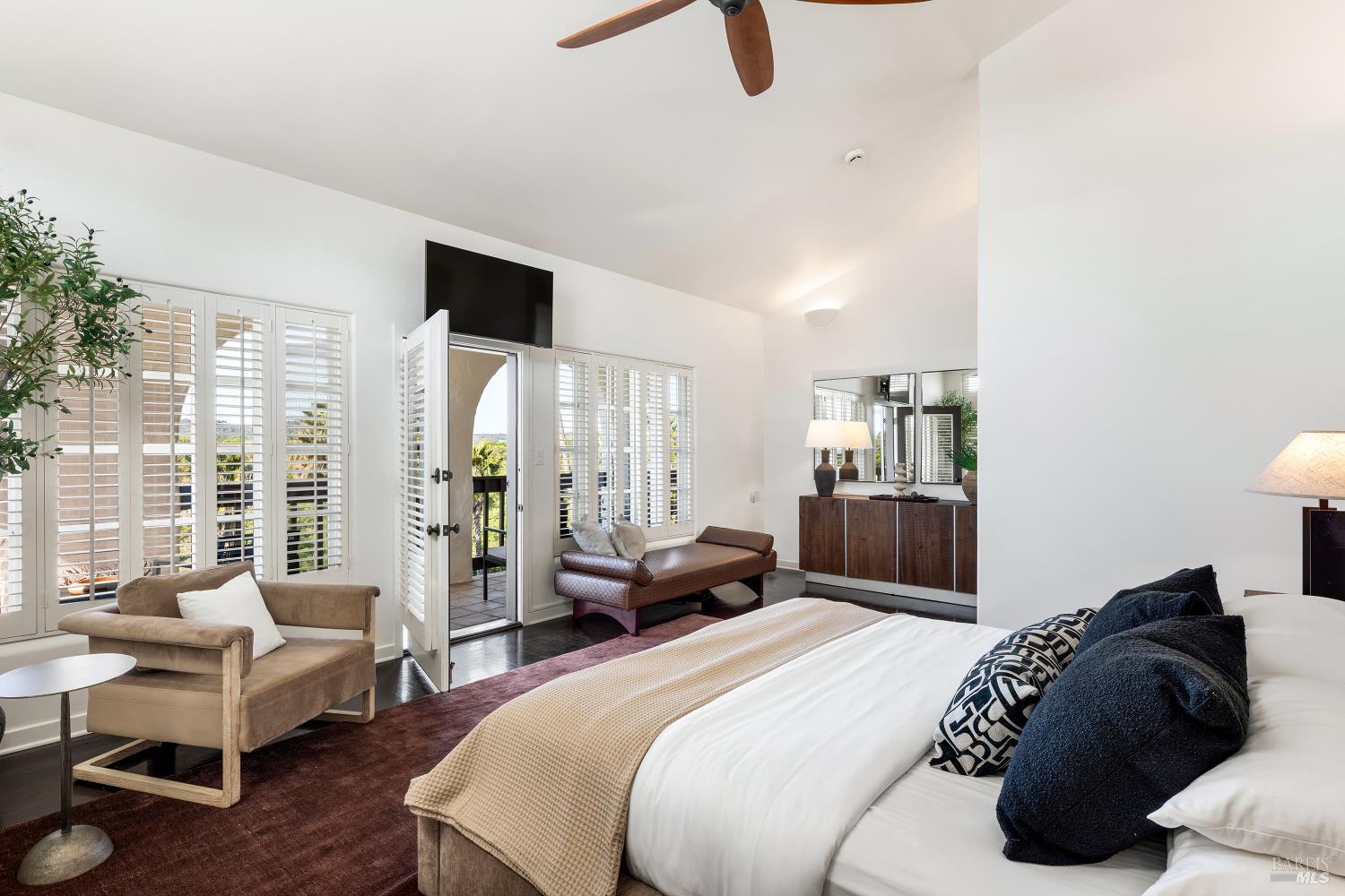 4377 Warm Springs Road Glen Ellen, CA 95442 - Photo 20 of 56 a bedroom with a bed and wooden floor