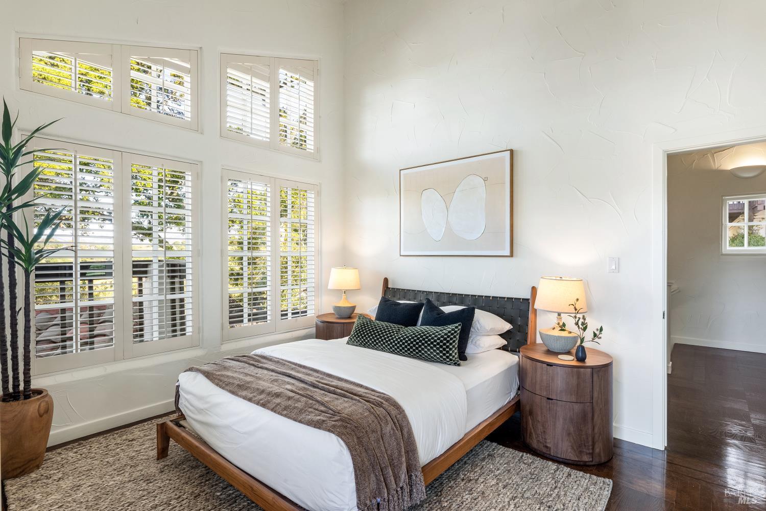 4377 Warm Springs Road Glen Ellen, CA 95442 - Photo 26 of 56 a bedroom with a large bed and a window