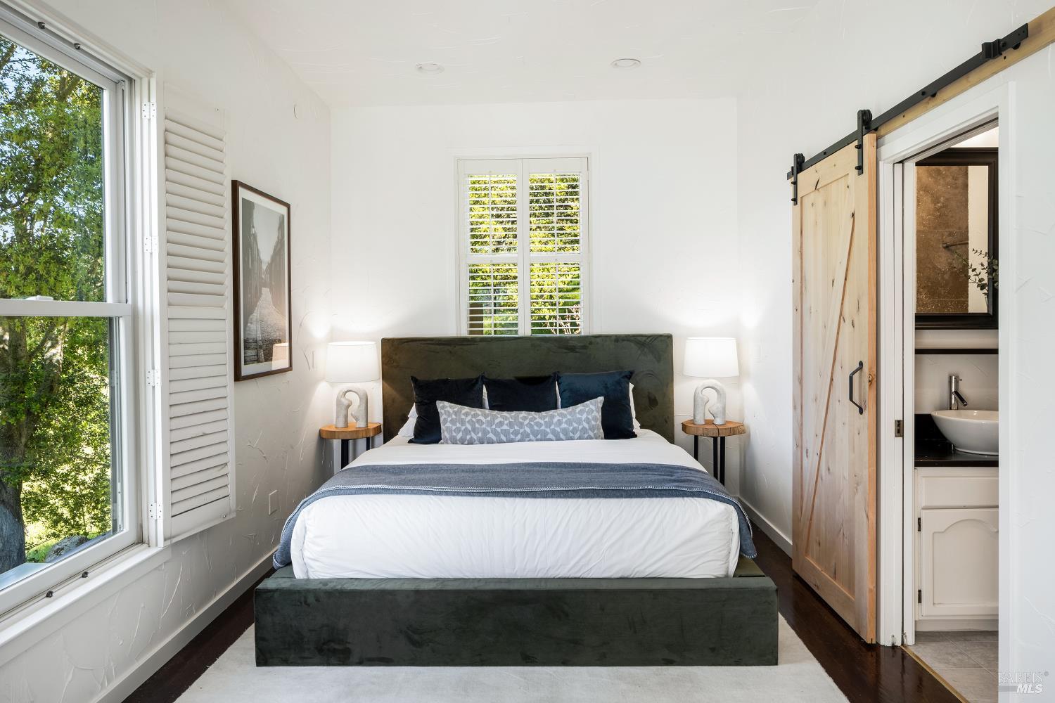 4377 Warm Springs Road Glen Ellen, CA 95442 - Photo 43 of 56 a bedroom with a bed next to a window