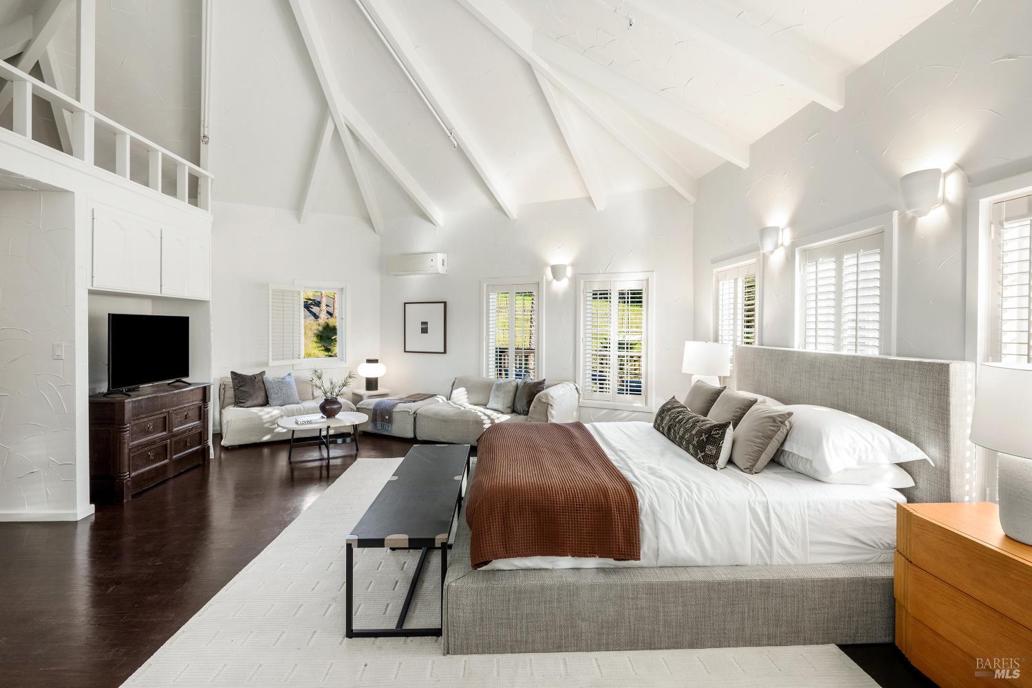 4377 Warm Springs Road Glen Ellen, CA 95442 - Photo 47 of 56 a bedroom with a balcony a bed and a couch