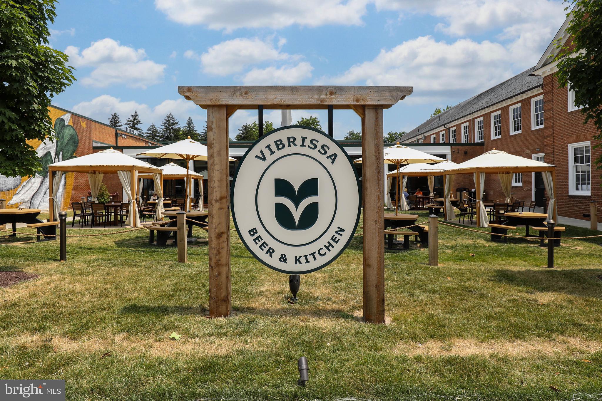 210 East Boscawen Street, Unit 203 Winchester, VA 22601 - Photo 25 of 27 a view of a house with a swimming pool and sitting area