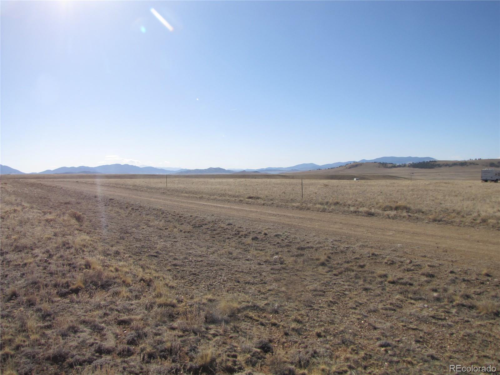235 Routt Road Hartsel, CO 80449 - Photo 13 of 13 a view of an ocean beach and mountain