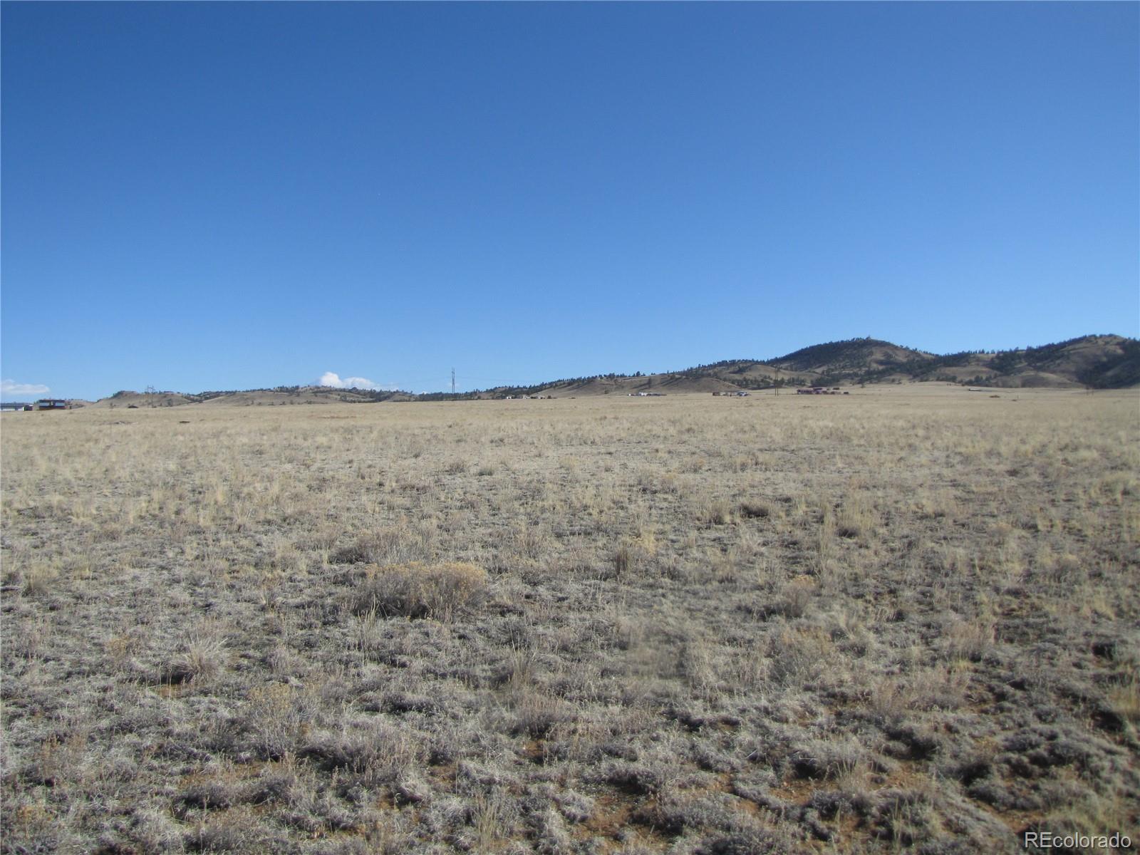 235 Routt Road Hartsel, CO 80449 - Photo 5 of 13 a view of ocean with a mountain in the background