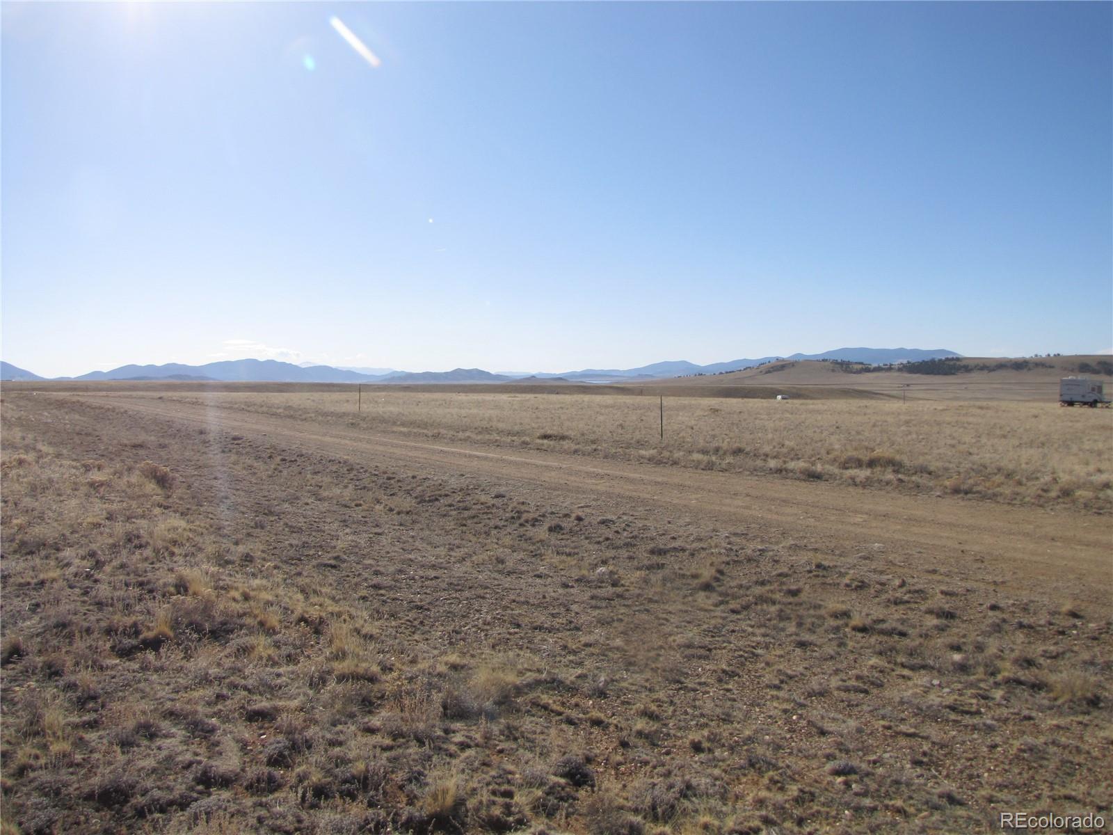 235 Routt Road Hartsel, CO 80449 - Photo 10 of 13 a view of an ocean beach and mountain