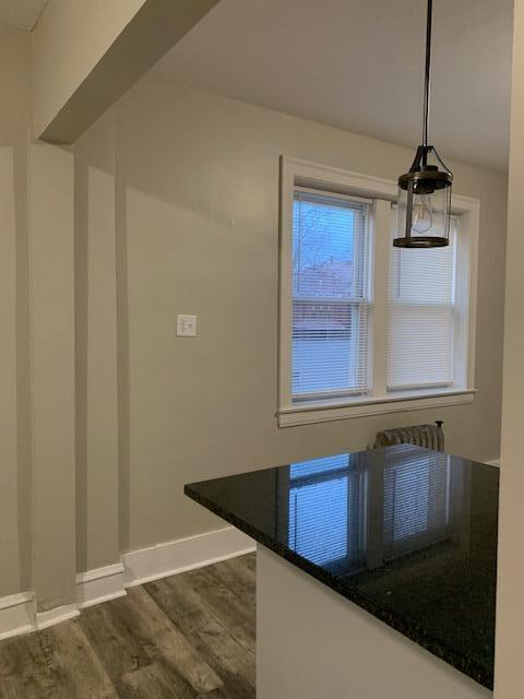 1923 Clark Street Whiting, IN 46394 - Photo 9 of 16 a kitchen with stainless steel appliances granite countertop a sink and a wooden cabinets