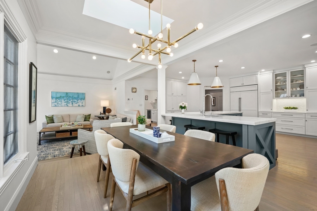 1 Myles Standish Road Weston, MA 02493 - Photo 11 of 40 a view of a dining room with furniture and a chandelier