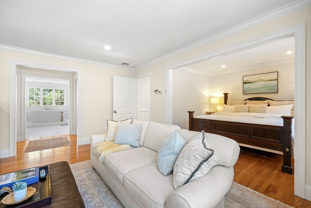 1 Myles Standish Road Weston, MA 02493 - Photo 15 of 40 a living room with furniture and a wooden floor