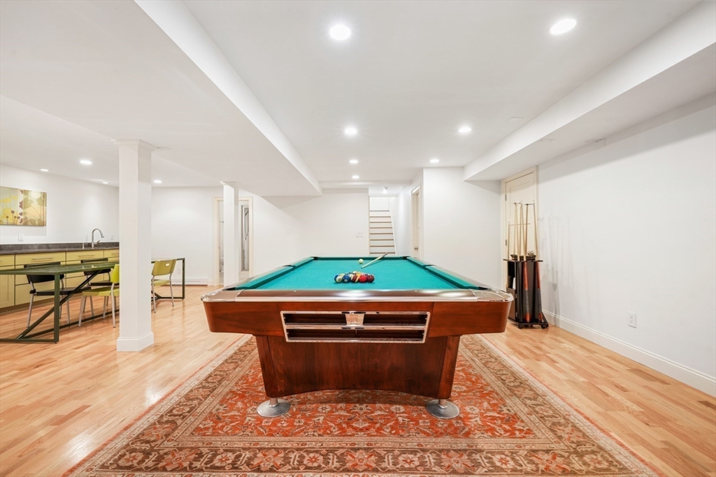 1 Myles Standish Road Weston, MA 02493 - Photo 26 of 40 a room with pool table and wooden floor