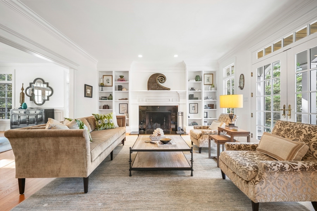 1 Myles Standish Road Weston, MA 02493 - Photo 3 of 40 a living room with furniture and a fireplace