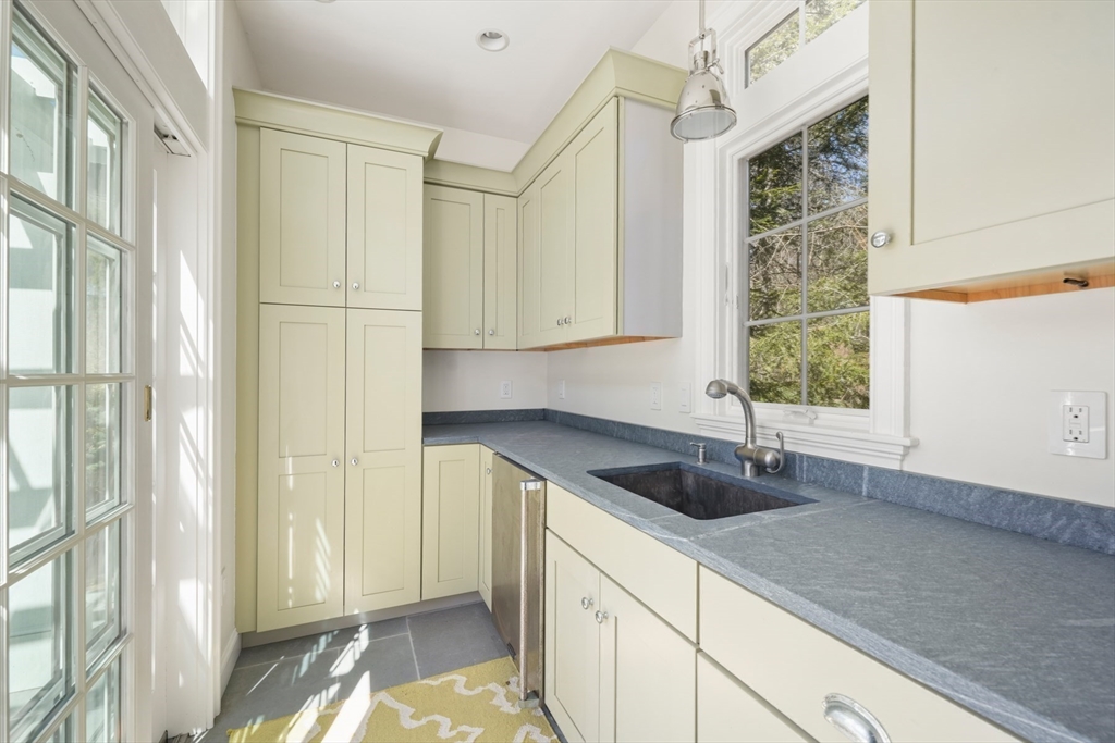 1 Myles Standish Road Weston, MA 02493 - Photo 36 of 40 a kitchen with a sink and a window