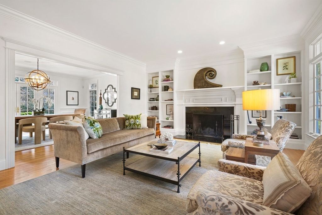1 Myles Standish Road Weston, MA 02493 - Photo 4 of 40 a living room with furniture and a fireplace