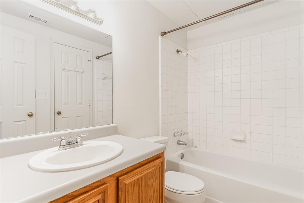 3329 Rosedale Avenue, Unit 21 University Park, TX 75205 - Photo 18 of 24 Full bath with vanity and washtub / shower combination