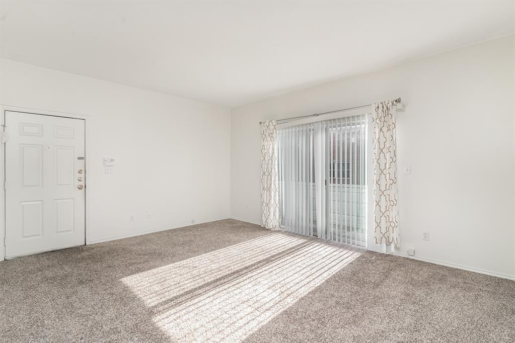 3329 Rosedale Avenue, Unit 21 University Park, TX 75205 - Photo 2 of 24 Empty room featuring carpet