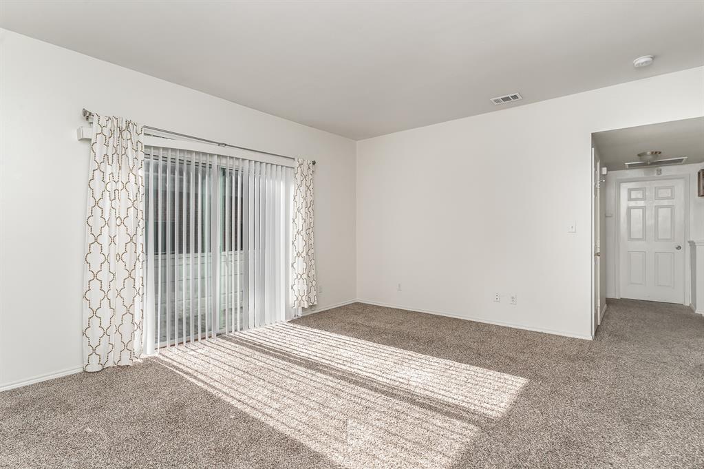 3329 Rosedale Avenue, Unit 21 University Park, TX 75205 - Photo 5 of 24 Unfurnished room with carpet floors and baseboards