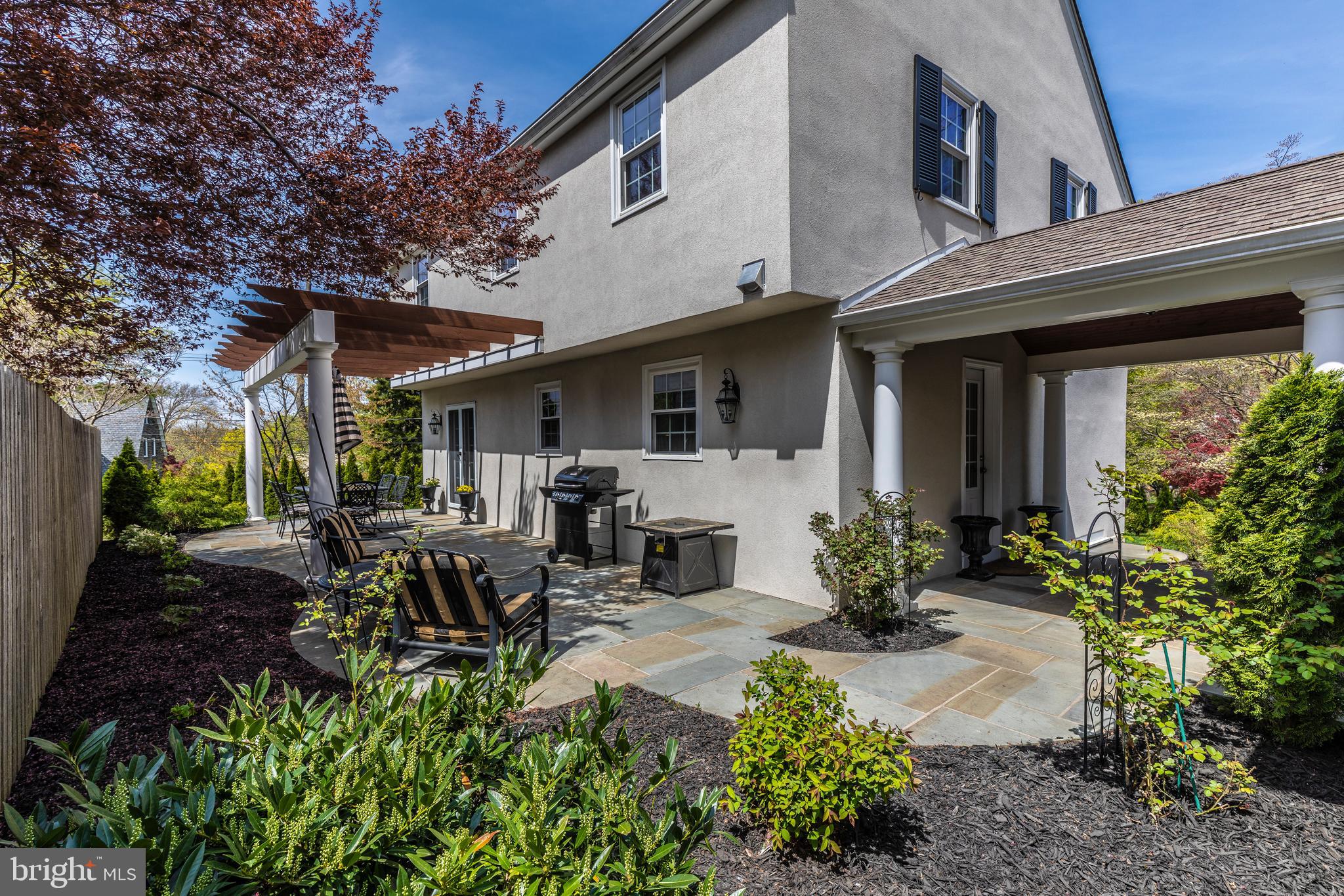 500 Midland Circle Wayne, PA 19087 - Photo 33 of 38 Rear view of large flagstone patio with pergola
