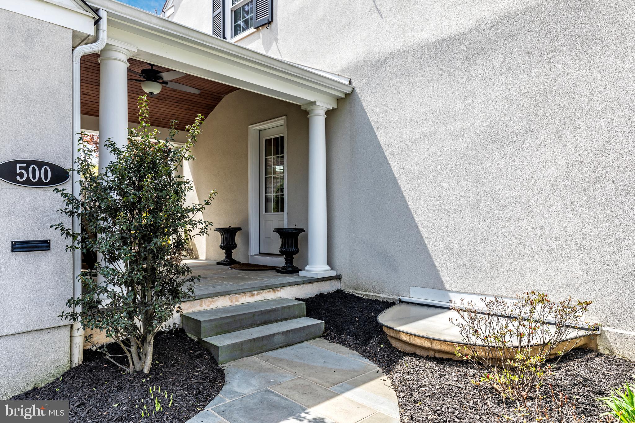 500 Midland Circle Wayne, PA 19087 - Photo 5 of 38 Flagstone walkway to breezeway with ceiling fan