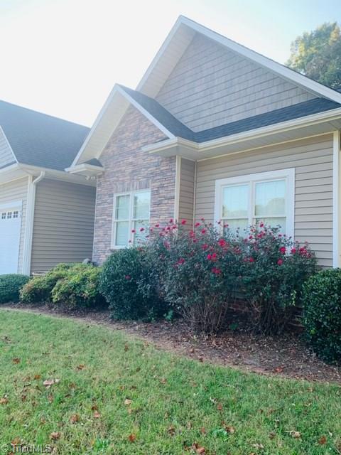 193 Dublin Road Advance, NC 27006 - Photo 3 of 44 Rose Bushes along the front flower bed