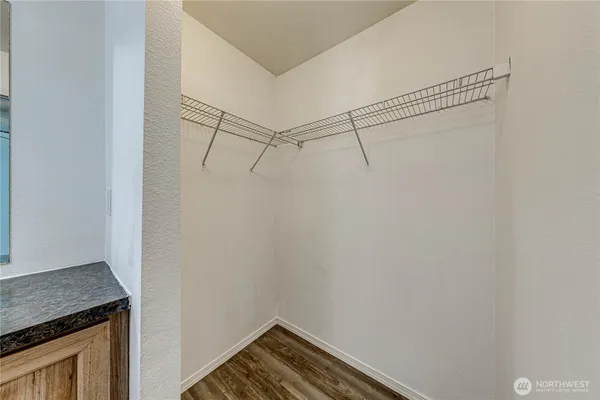 a view of a bathroom from a hallway