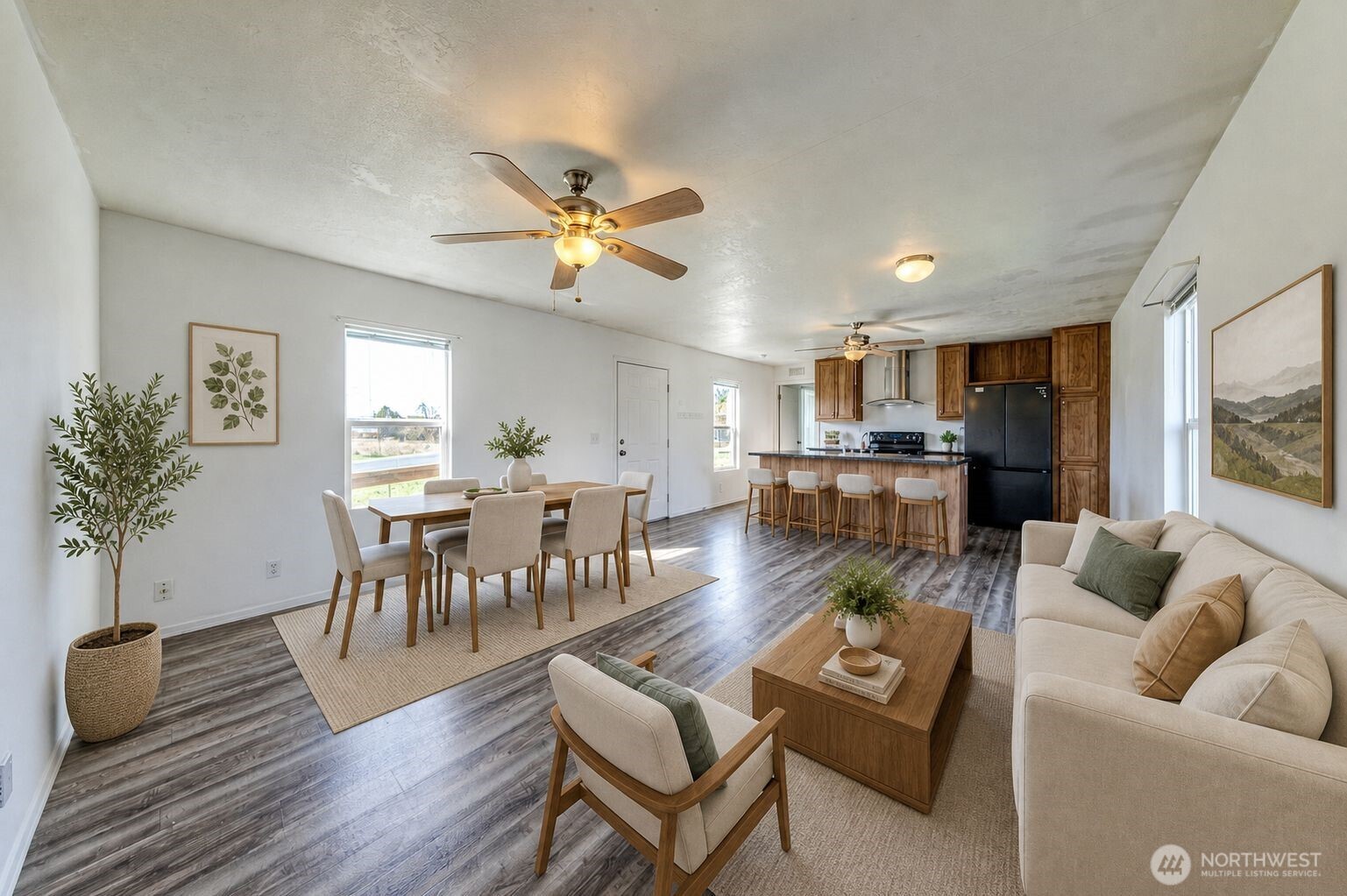 491 Mill Road, Unit 8 Sequim, WA 98382 - Photo 29 of 37 a living room with furniture kitchen view and a dining table