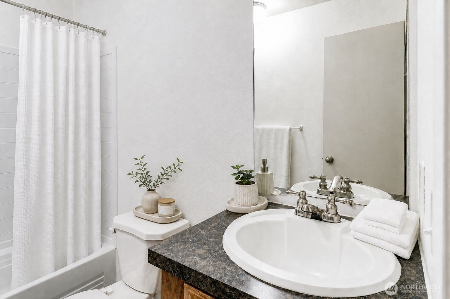 491 Mill Road, Unit 8 Sequim, WA 98382 - Photo 37 of 37 a bathroom with a granite countertop sink and a mirror