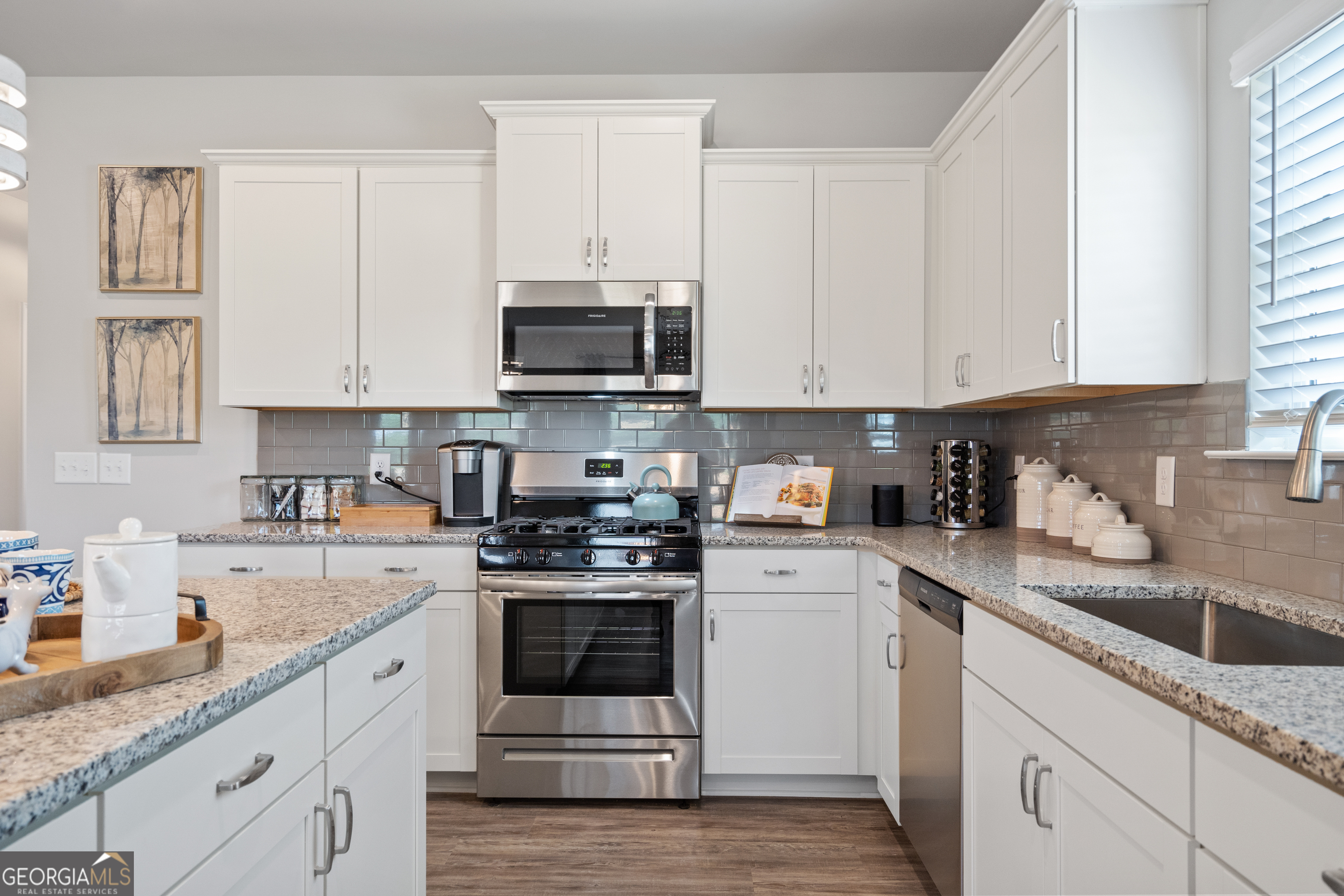 256 Shantz Way, Unit (LOT A45) Byron, GA 31008 - Photo 11 of 25 a kitchen with granite countertop white cabinets white stainless steel appliances and a sink