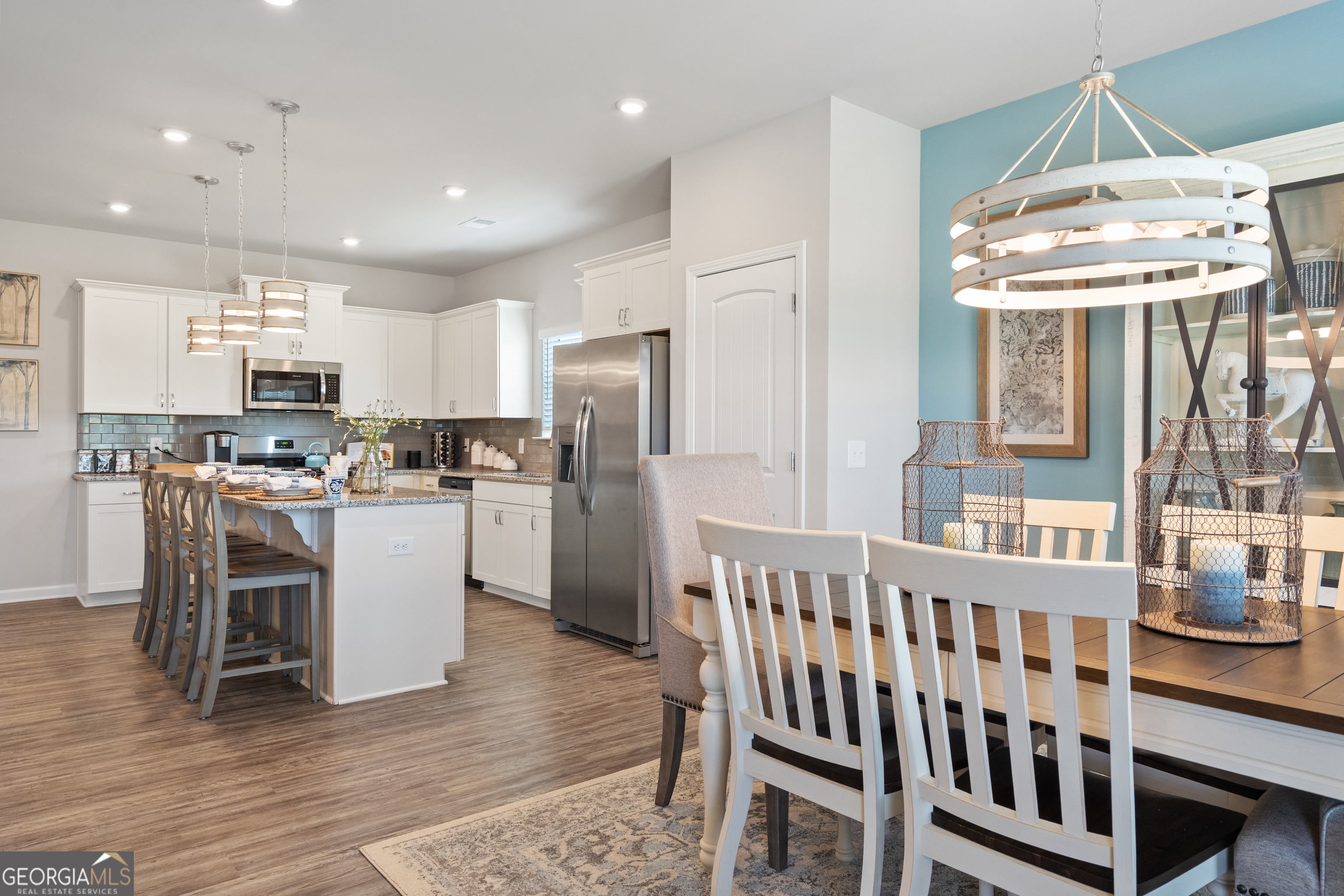 256 Shantz Way, Unit (LOT A45) Byron, GA 31008 - Photo 13 of 25 a kitchen with a table chairs refrigerator and microwave
