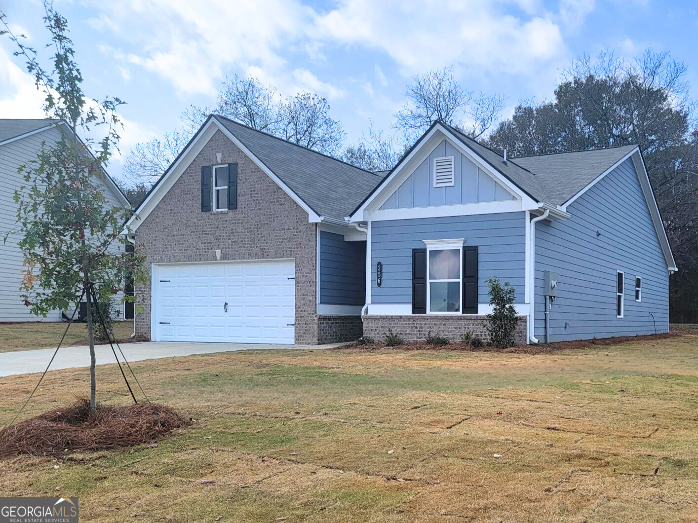 256 Shantz Way, Unit (LOT A45) Byron, GA 31008 - Photo 2 of 25 a front view of a house with a yard