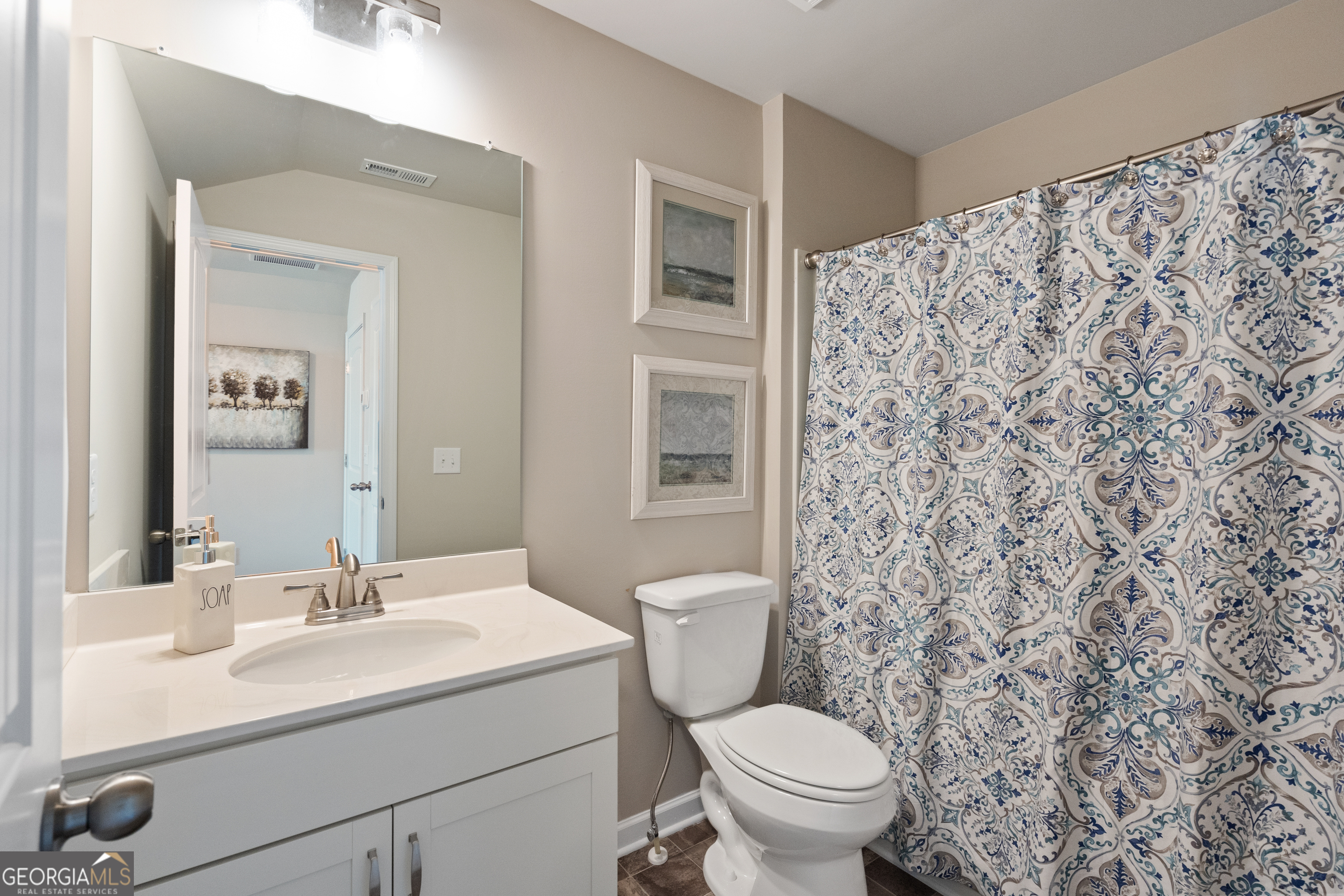 256 Shantz Way, Unit (LOT A45) Byron, GA 31008 - Photo 24 of 25 a bathroom with a sink toilet and mirror