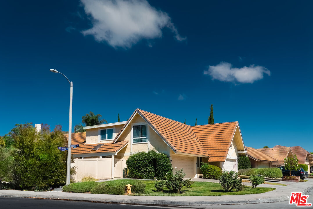 27003 Rio Prado Drive Valencia, CA 91354 - Photo 1 of 40 a view of a house with a yard