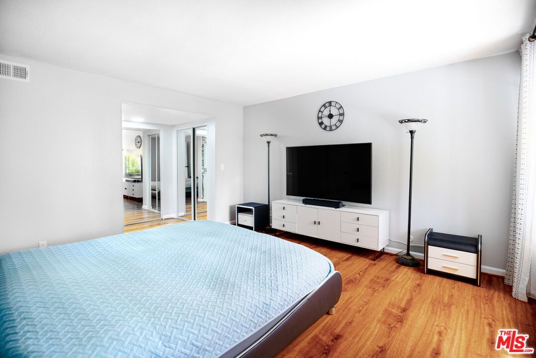 27003 Rio Prado Drive Valencia, CA 91354 - Photo 13 of 40 a living room with furniture and a flat screen tv