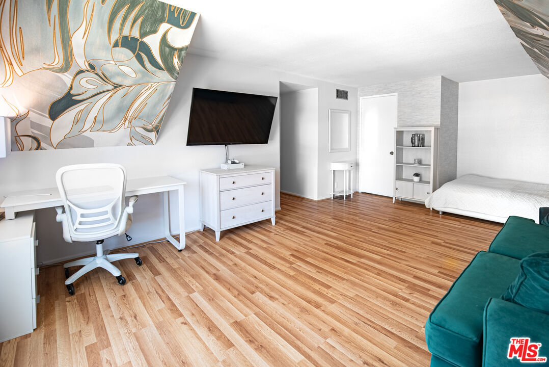 27003 Rio Prado Drive Valencia, CA 91354 - Photo 21 of 40 a living room with furniture and a flat screen tv