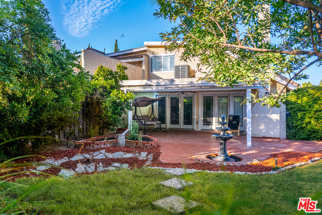 27003 Rio Prado Drive Valencia, CA 91354 - Photo 35 of 40 front view of a house with a yard