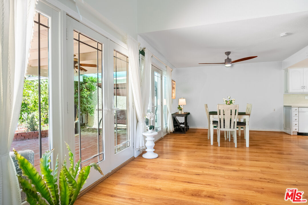 27003 Rio Prado Drive Valencia, CA 91354 - Photo 5 of 40 a living room with furniture and a floor to ceiling window