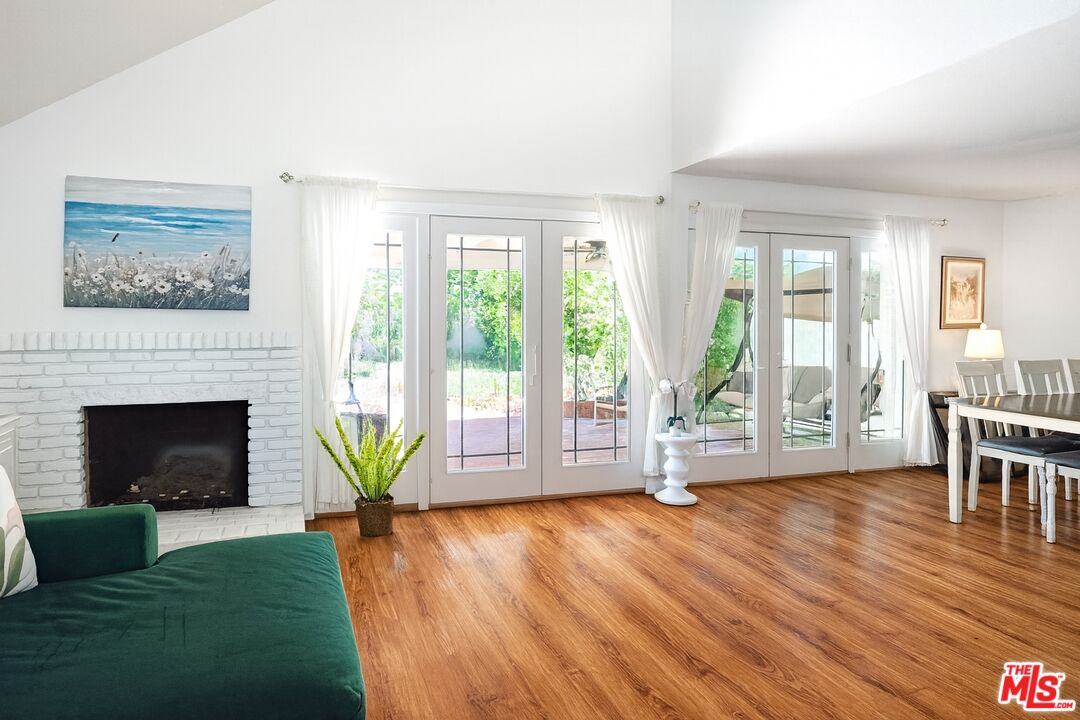 27003 Rio Prado Drive Valencia, CA 91354 - Photo 6 of 40 a living room with furniture and a fireplace
