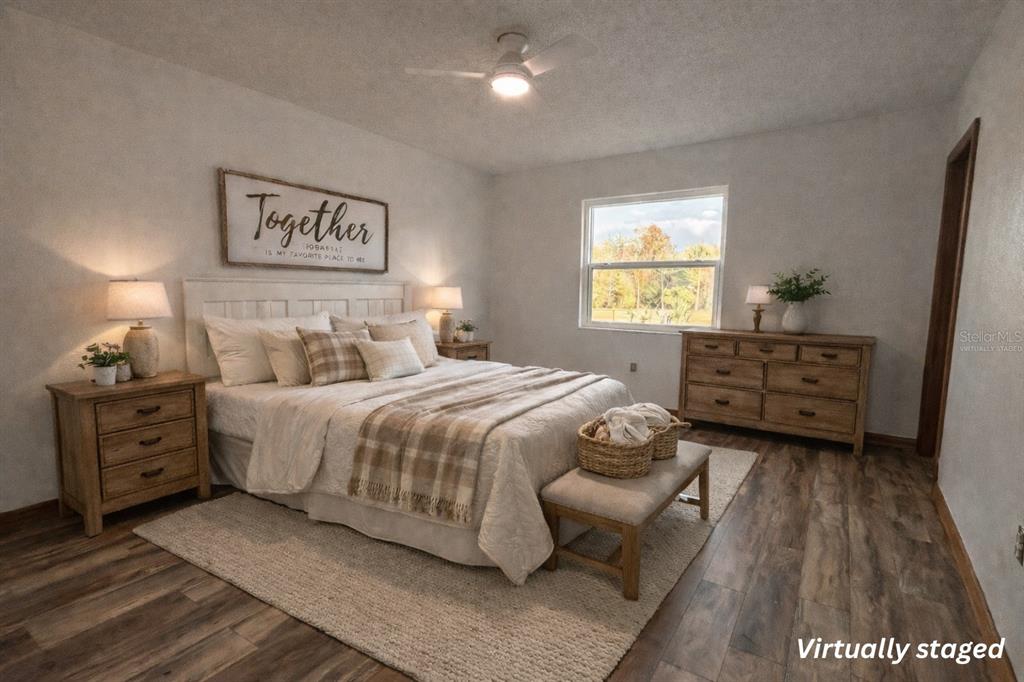 5028 Ralston Road Lakeland, FL 33811 - Photo 12 of 29 a bedroom with a bed and a window