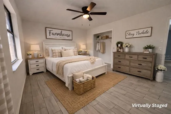 a view of a room with wooden floor