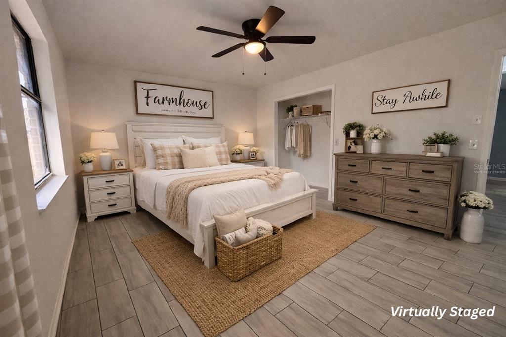 5028 Ralston Road Lakeland, FL 33811 - Photo 26 of 29 a bedroom with a bed and ceiling fan